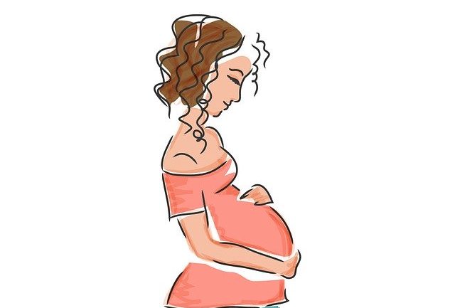 An illustration of a pregnant girl wearing a pink blouse and her hands placed on the baby bump.